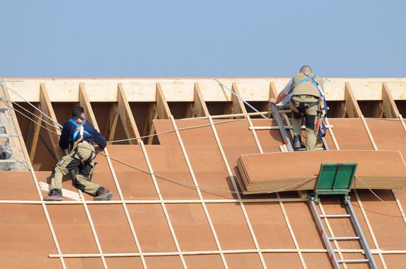 Roofers installing a new roof