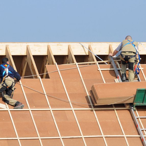Roofers installing a new roof